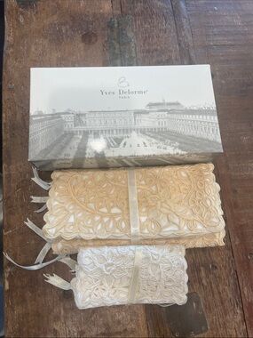 Yves Delorme Travel Jewelry holders. New. Set of 2 in Champagne and off white.